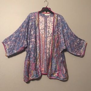 Embellished paisley boho cover.